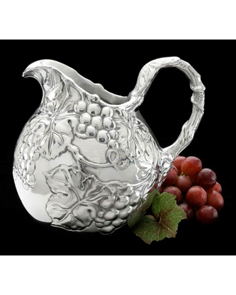 Arthur Court Designs Pour some class into your dinner or drinking party with this Small Grape Pitcher from Arthur Court. <br />
<br />
Bundles of grapes and leaves display beautifully on the piece's body, while thick, swishing vines fill in these designs and form the handle. The handmade