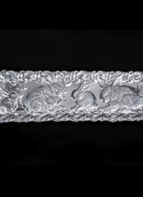 Arthur Court Designs Bunny Oblong Tray<br />
A group of rabbits band together in the middle of this tray as the dense forest surrounds them. Our craftsmen capture incredible detail within the bunnies' fur and the framing foliage in this handmade, aluminum design.