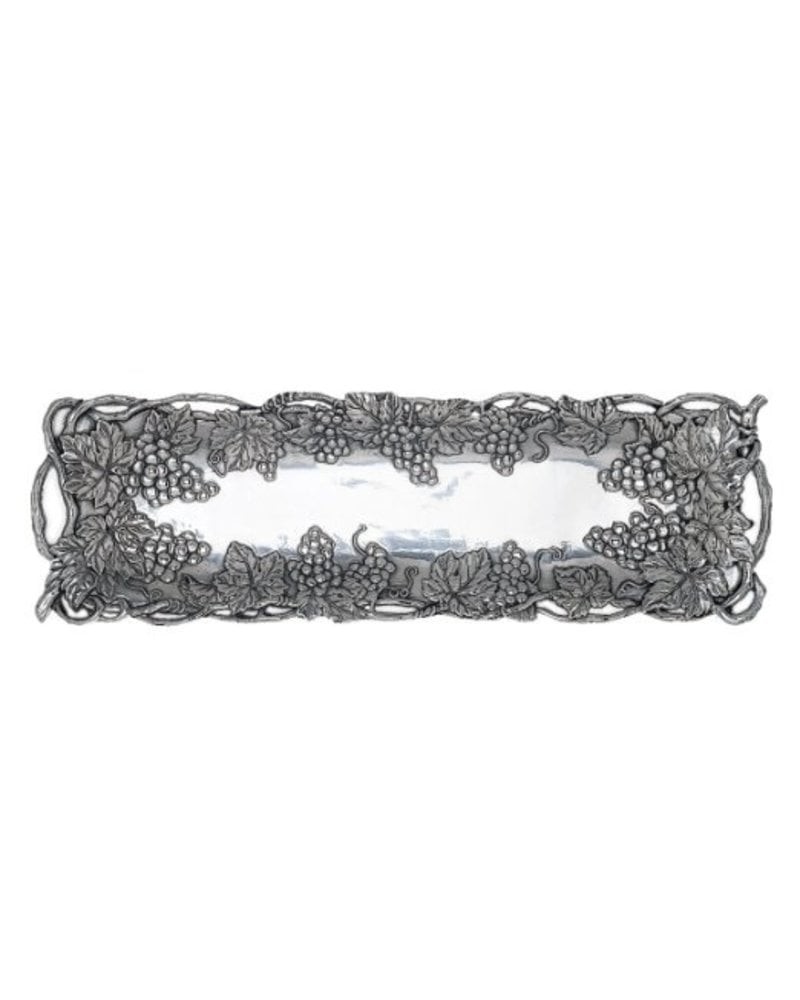 Arthur Court Designs Grape Rectangular Platter<br />
Intertwined vines weave unpredictably around the outisde of this dish, while bundles of grapes and leaves rest on either corner of the square. The busy exterior of this handmade, aluminum tray serves as a picturesque frame for th