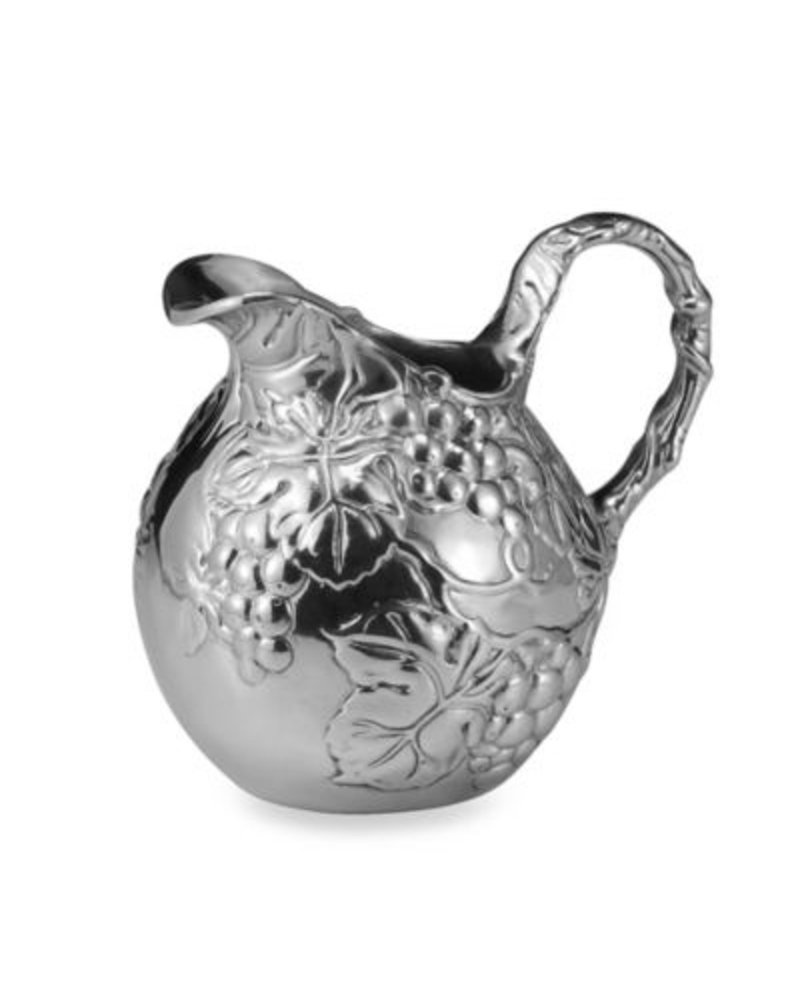 Arthur Court Designs Pour the fancy back into your dinner or drinking party with this Small Grape Pitcher from Arthur Court. <br />
<br />
Large leaves and bundles of grapes display in beauitful detail around this piece, while thick, swishing vines create the handle and fill extra space.