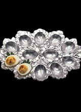 Arthur Court Designs Sophisticate this Easter favorite with Arthur Court's beautifully defined Bunny Deviled Egg Holder. <br />
<br />
Intricately detailed rabbits sit prominently on opposite ends of this piece, while veins flow through the leafy-patterned interior and edges. Handcrafted