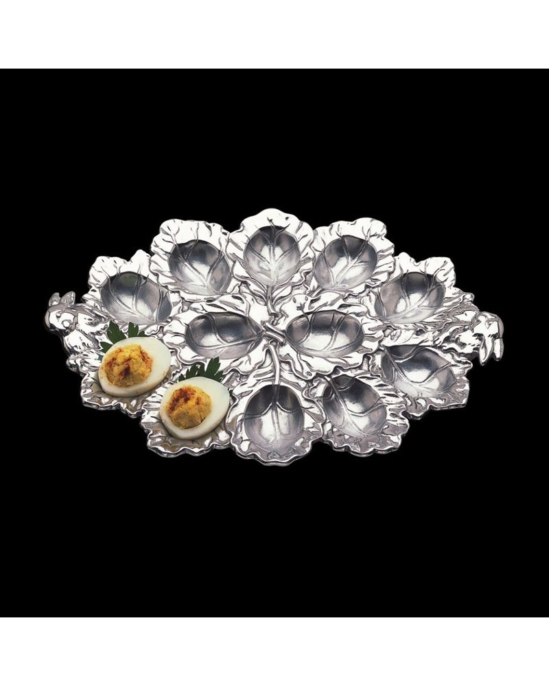 Arthur Court Designs Sophisticate this Easter favorite with Arthur Court's beautifully defined Bunny Deviled Egg Holder. <br />
<br />
Intricately detailed rabbits sit prominently on opposite ends of this piece, while veins flow through the leafy-patterned interior and edges. Handcrafted