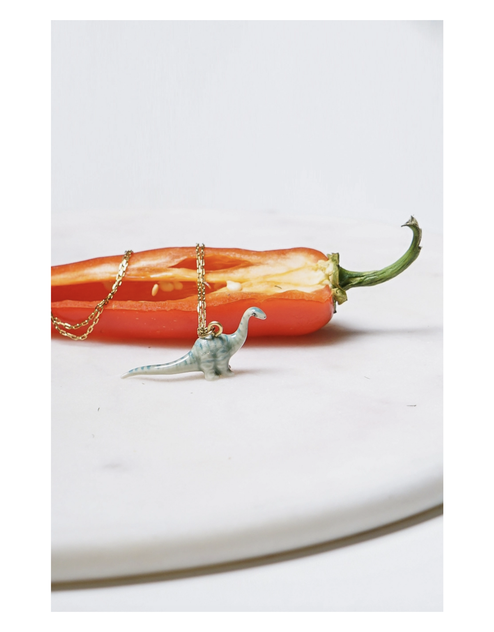 Tiny Ceramic Dinosaur Necklace