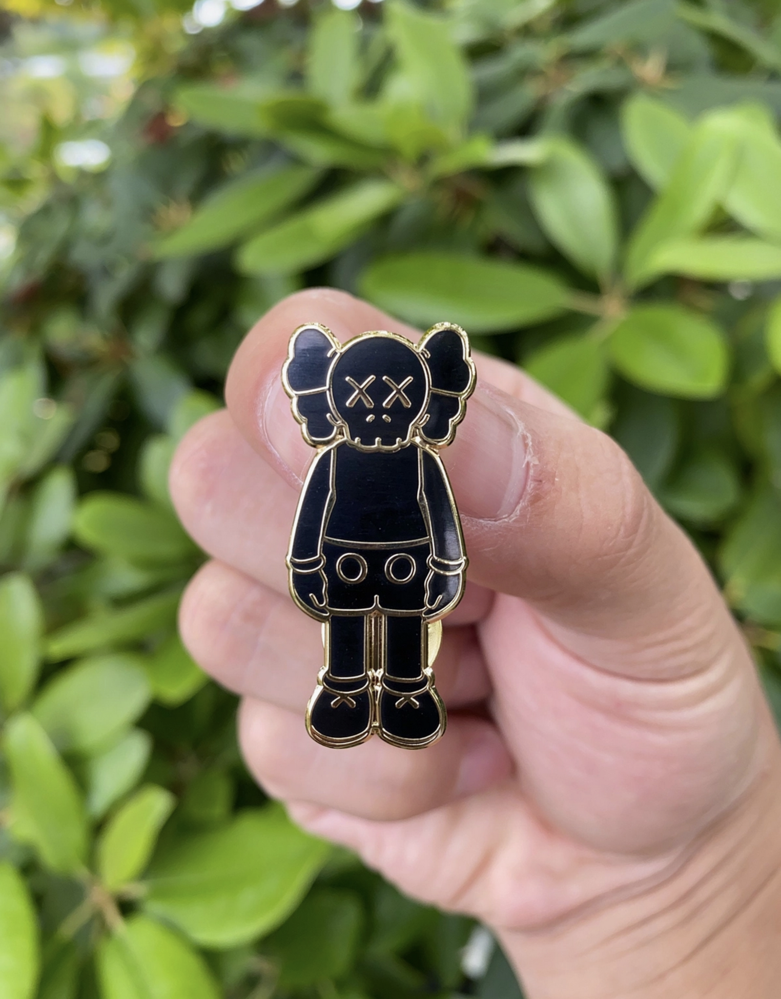 HypeBeast KAWS Black and Gold Enamel Pin