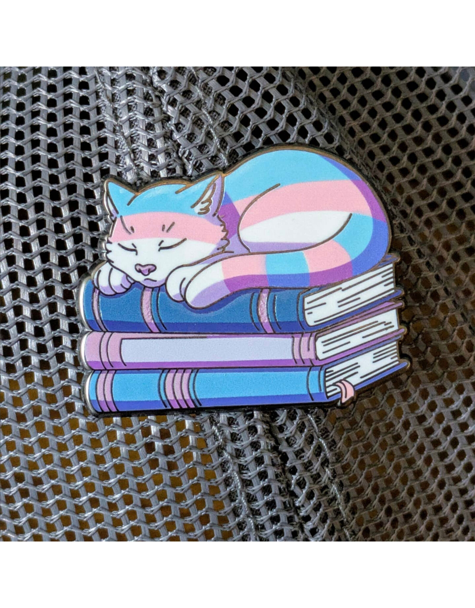 Trans Cat on Pile of Books Enamel Pin