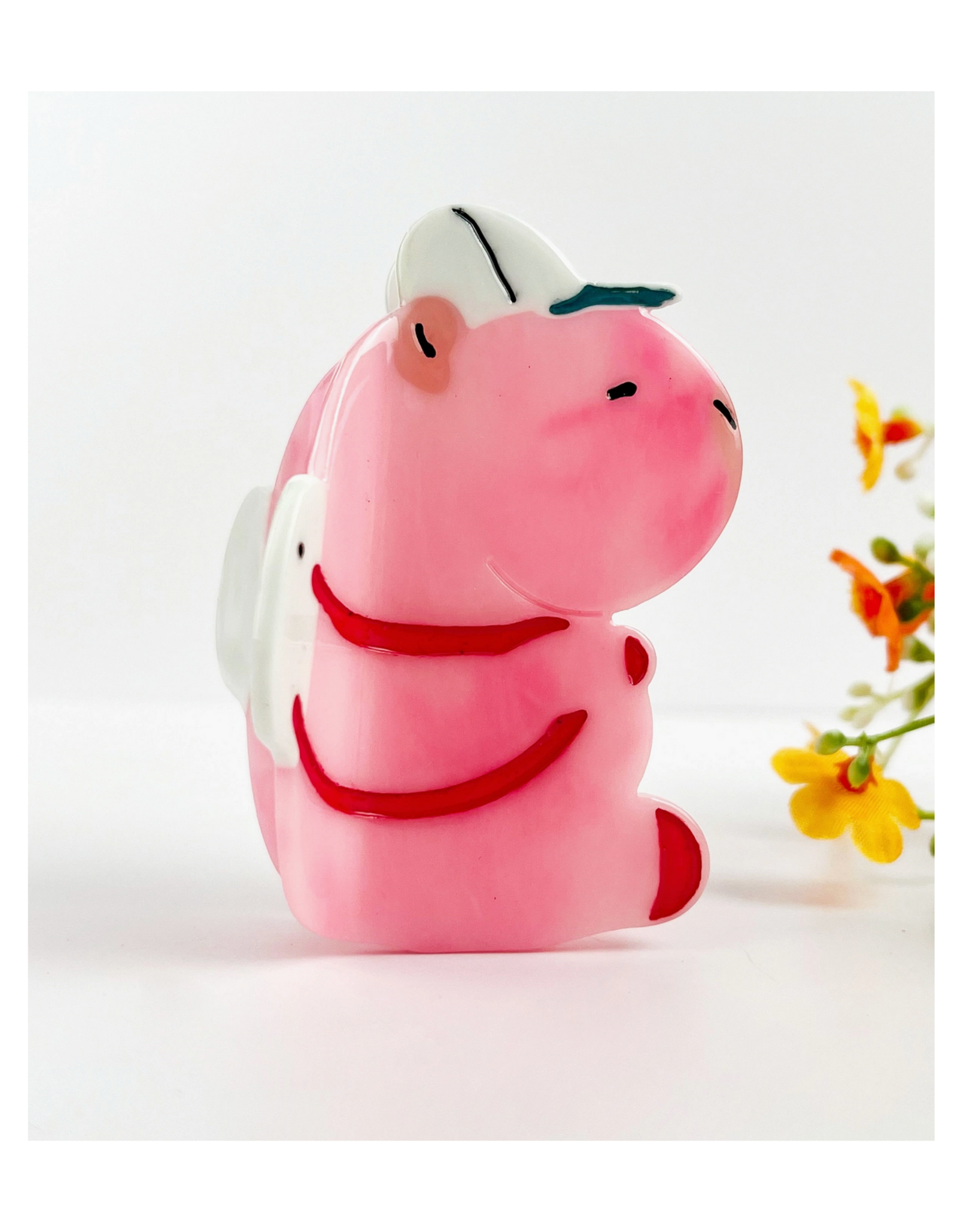 Pink Capybara in Cap Claw Clip