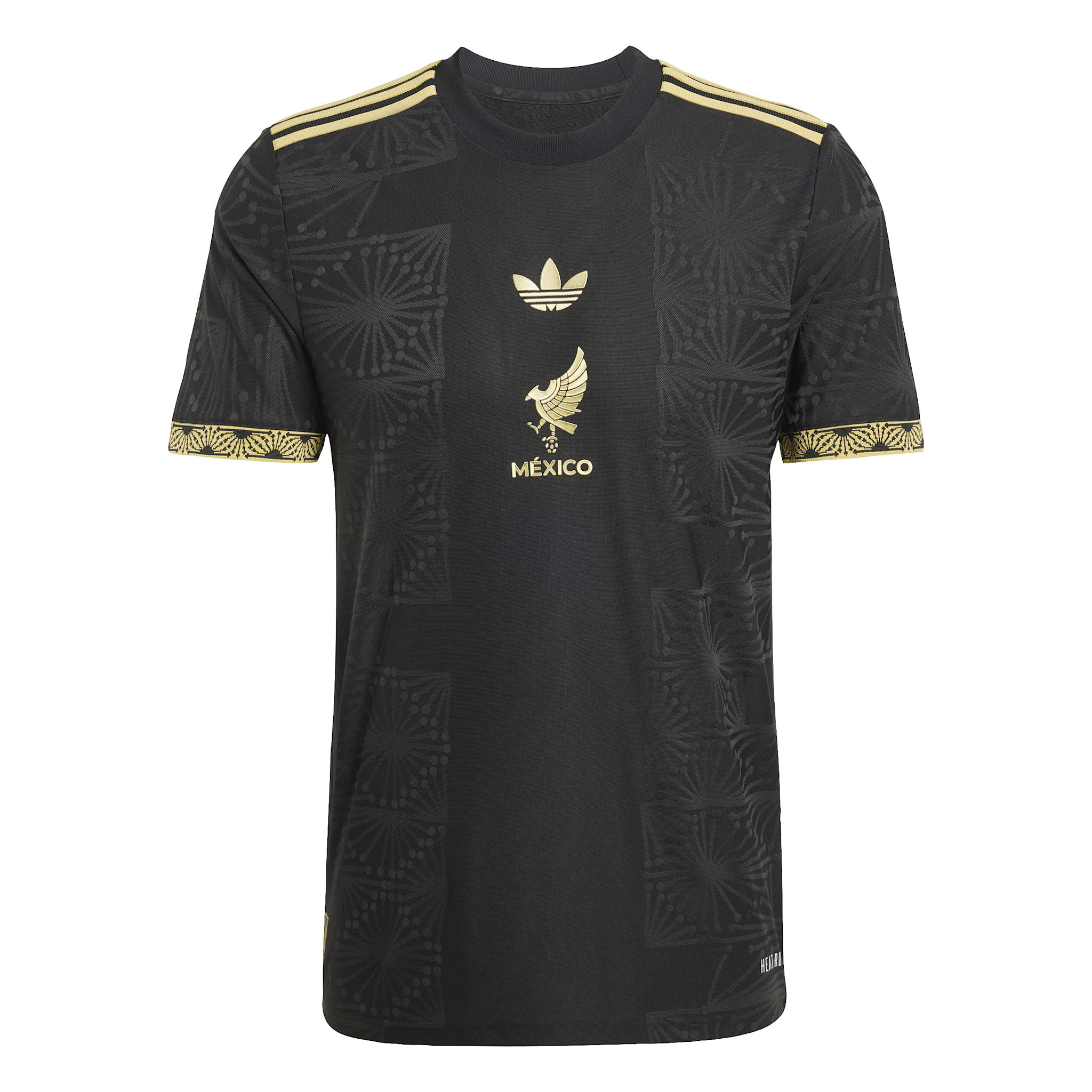 black adidas with gold stripes