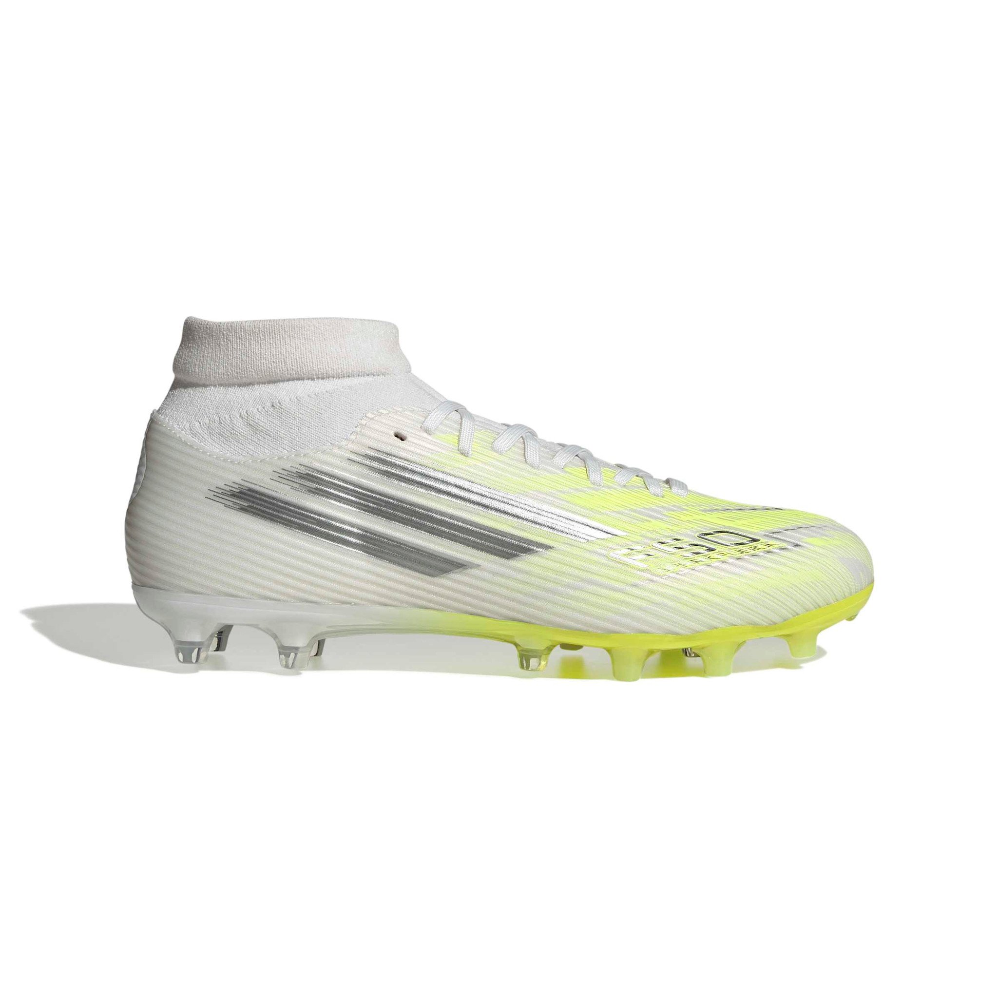 white and yellow football cleats