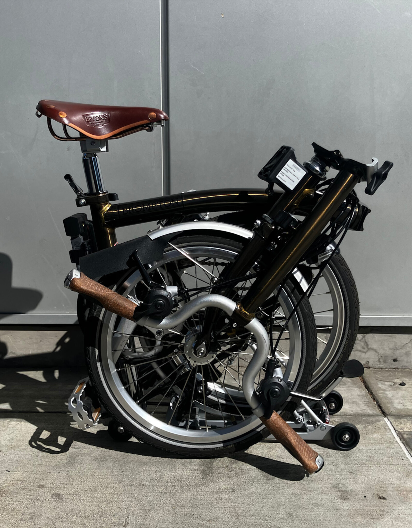 Brompton Brompton - Bike - C Line 6-speed, Mid-rise HB, Std SP, Brooks B17s Special Brown, Ergon GP1-S BioKork Grips, Dynamo lighting, Rear Rack, Black Lacquer w/Chrome Parts