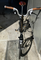 Brompton Brompton - Bike - C Line 6-speed, Mid-rise HB, Std SP, Brooks B17s Special Brown, Ergon GP1-S BioKork Grips, Dynamo lighting, Rear Rack, Black Lacquer w/Chrome Parts