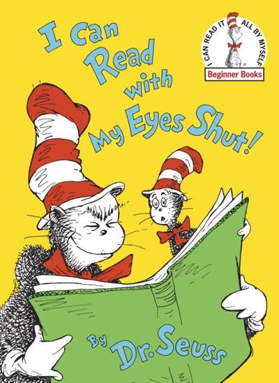 cat in the hat reading a book