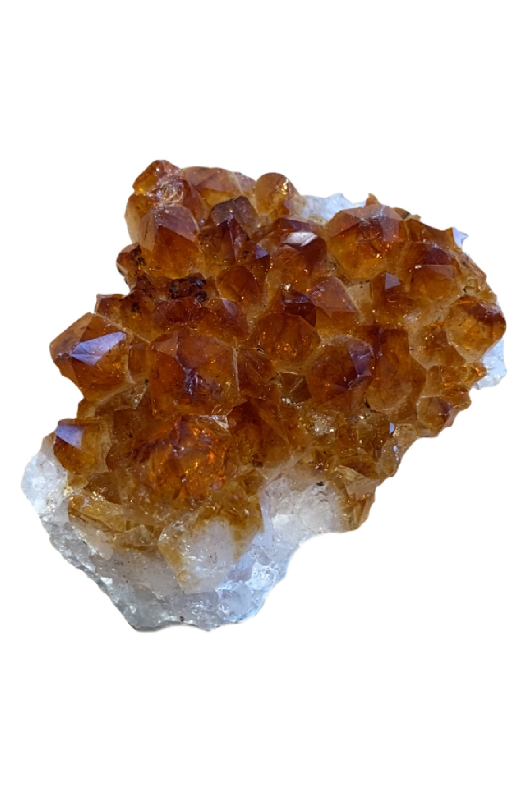 Tangerine colored piece of citrine with traditional needle-like points