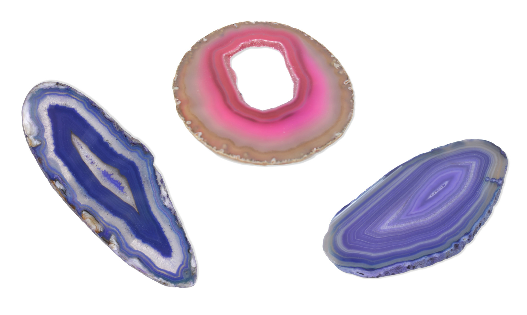 3 pieces of agate slices; 2 pieces are purple and one is fushia pink. All pieces feature unique circular waves and patterns