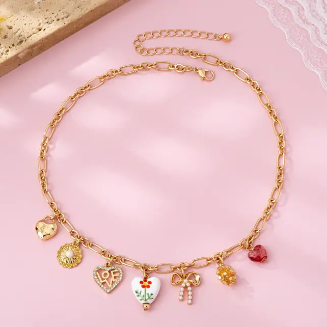 Gold Plated Figaro Chain Multi-Charm Necklace | 80N92748