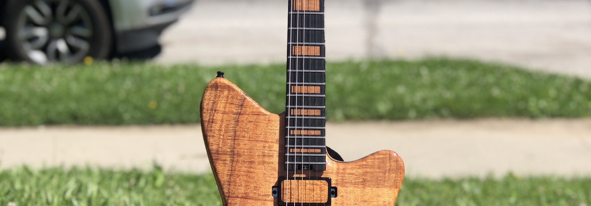 Bridge Builder Guitars - 1 piece Figured Koa top JazzBuilder