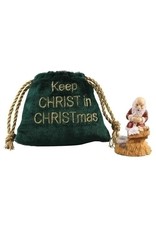 Kneeling santa orn in bag