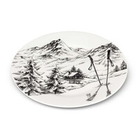 Petite assiette avec paysage d'hiver