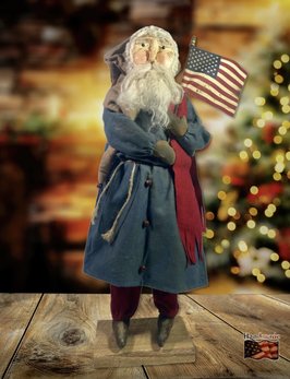 Handcrafted By Michelle Primitive Santa Blue Coat Holding Flag - 24" T