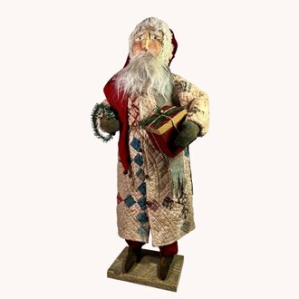 Santa in Quilt Robe Holding Wrapped Present - 24.5"