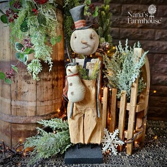 Josh Snowman Doll Holding Snowbaby