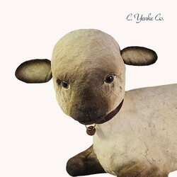 C. Yenke Lamb Figurine Lying Down