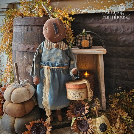 Alberta Pumpkin Doll Holding Pumpkin Seeds Box