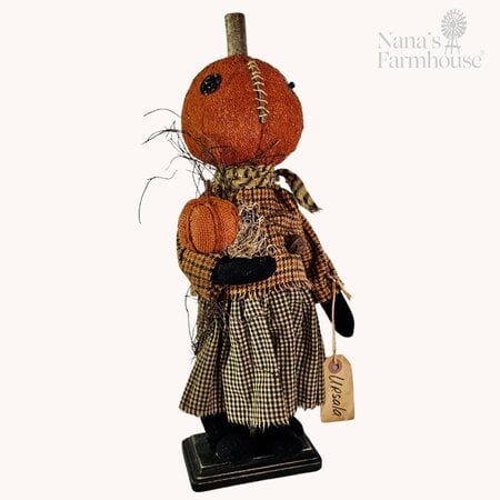 Ursala Pumpkin Girl Doll holding Pumpkin