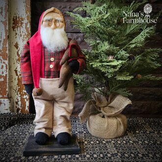 Mr Claus Holding Gingerbread Man