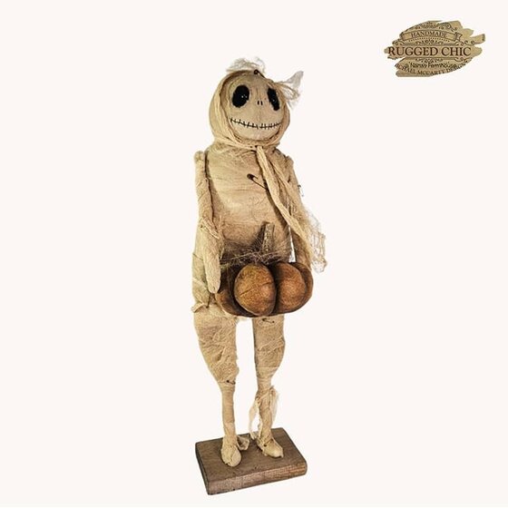 Mummy Doll Holding Pumpkin