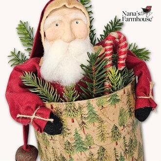 Santa In Christmas Box Holding Candy Cane
