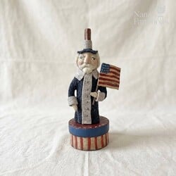 Uncle Sam Standing on Striped Box with Flag - 11"