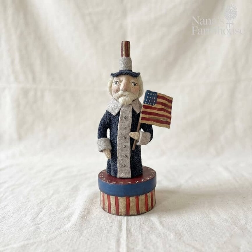 Uncle Sam Standing on Striped Box with Flag - 11"