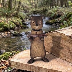 Beaver Holding Sticks Figurine - 7.25"