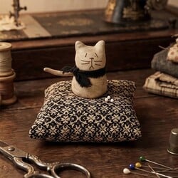 Cat Sitting on Coverlet Pin Cushion - 5.5" T x 5" W