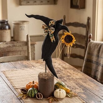 Black Crow Sunflower in Rusted Coffee Can