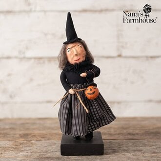 Witch Holding Pumpkin