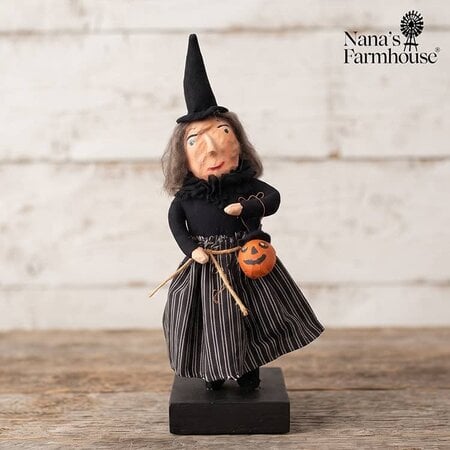 Witch Holding Pumpkin