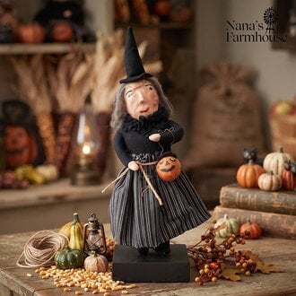 Witch Holding Pumpkin