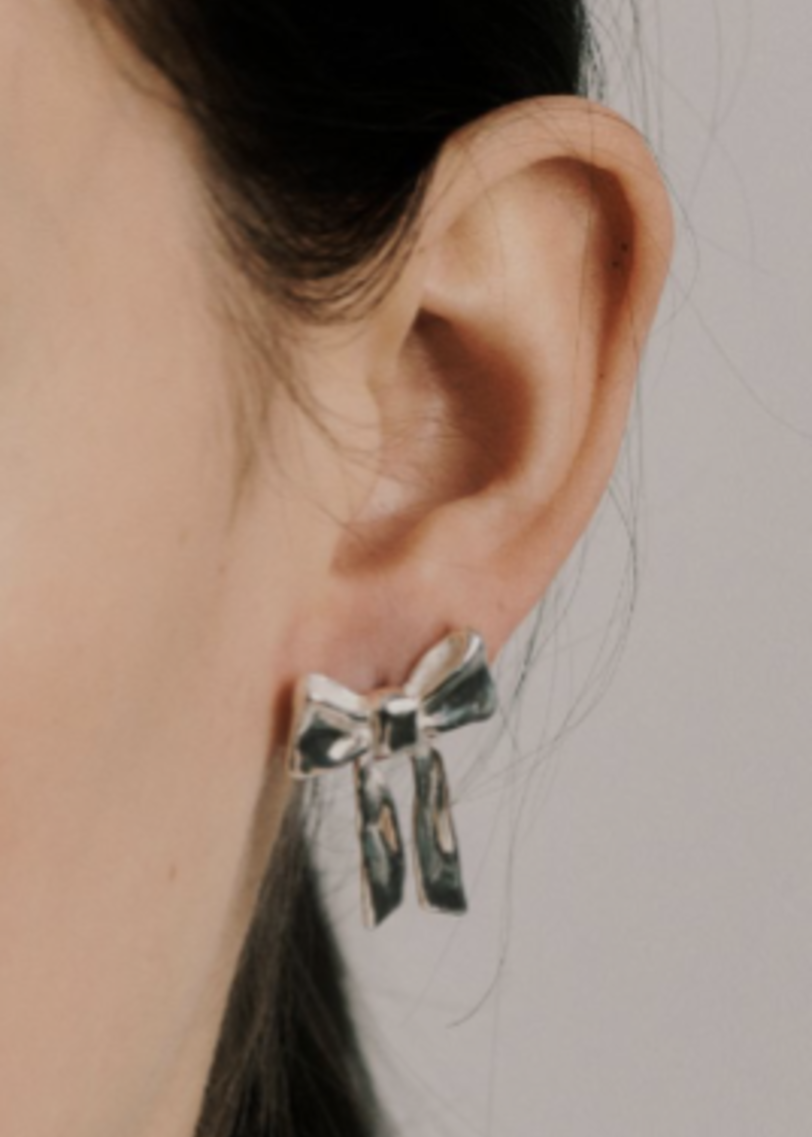 Wolf Circus Bow Stud Earring