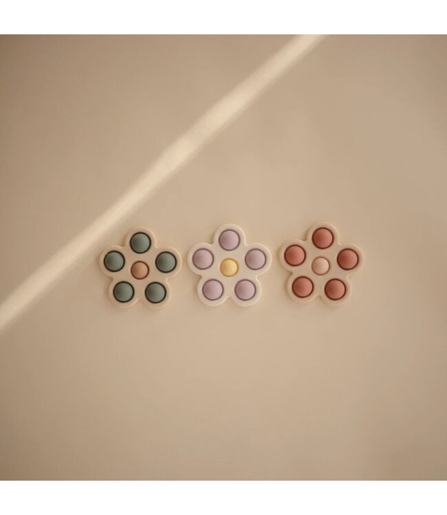 MUSHIE JOUET EN SILICONE - PRESSE-FLEUR ROSE