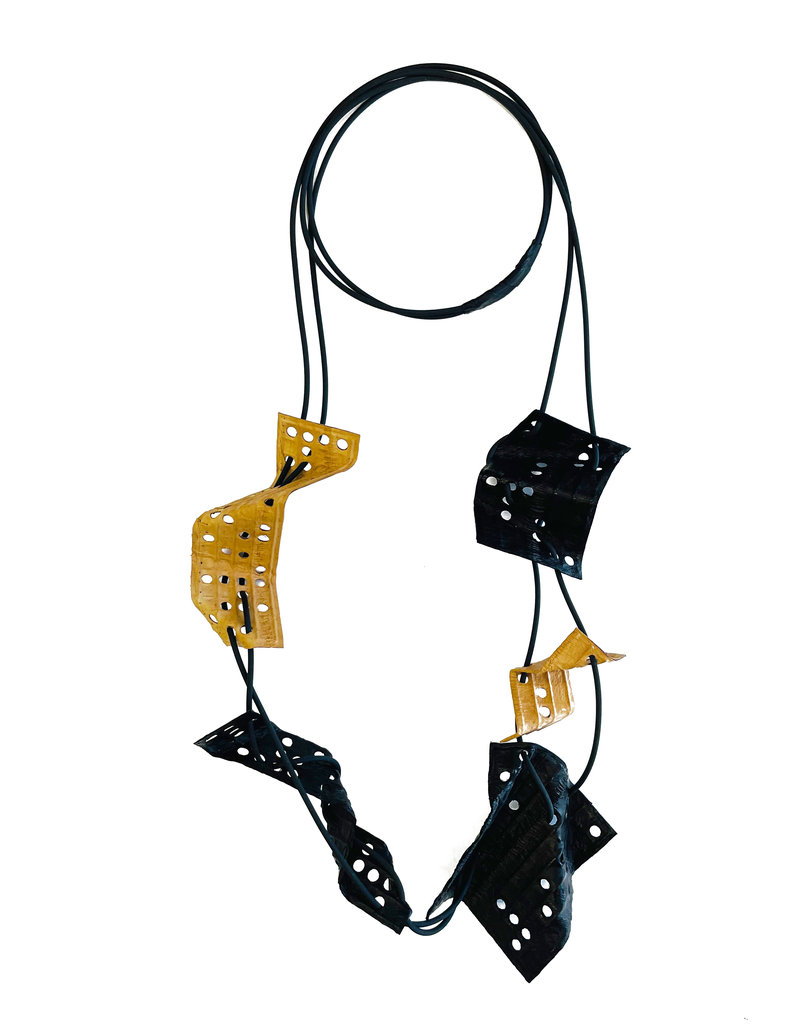 Marija Bajovska Perforated multi geometric eel skin N