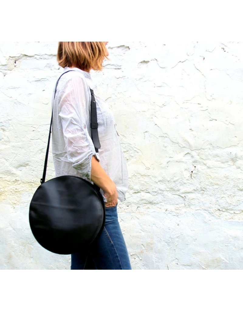 black circle crossbody bag