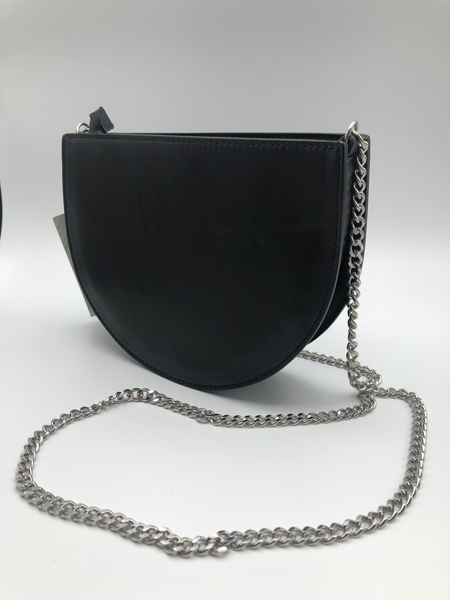 black circle crossbody bag