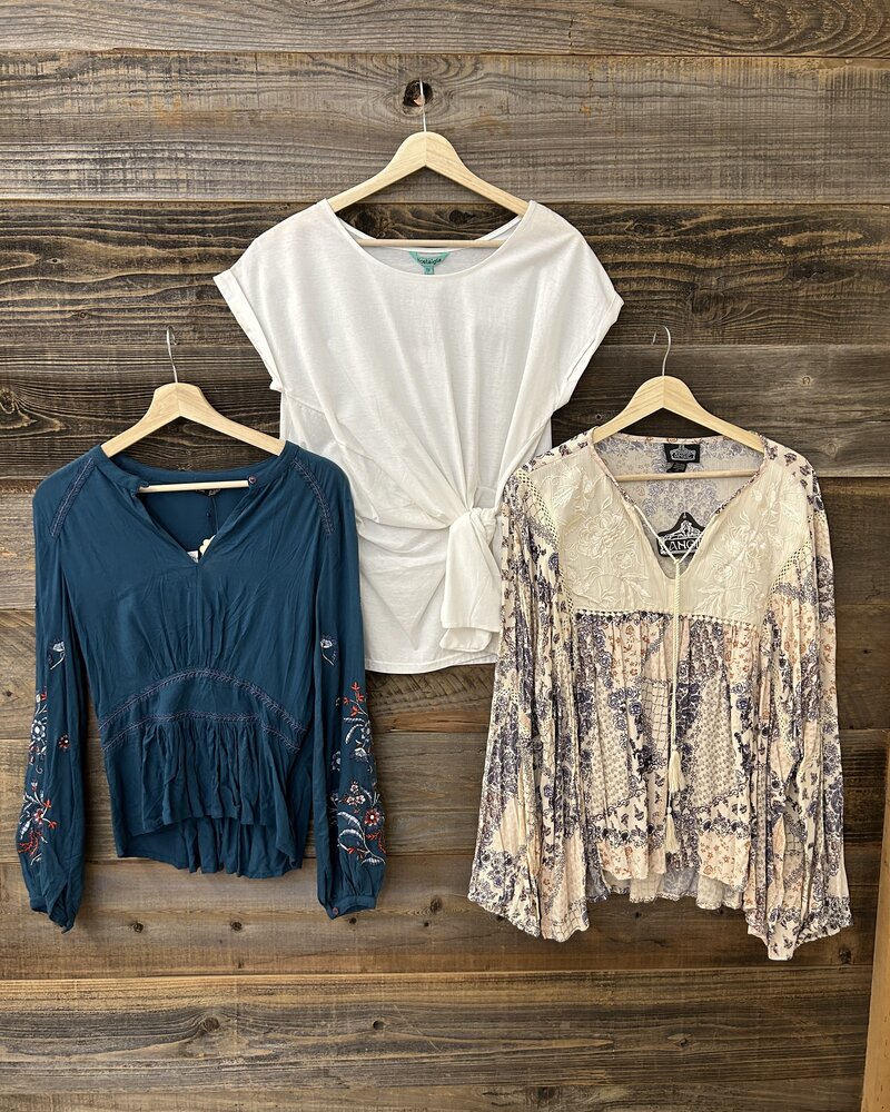 In Three’s Simple Details Tops
