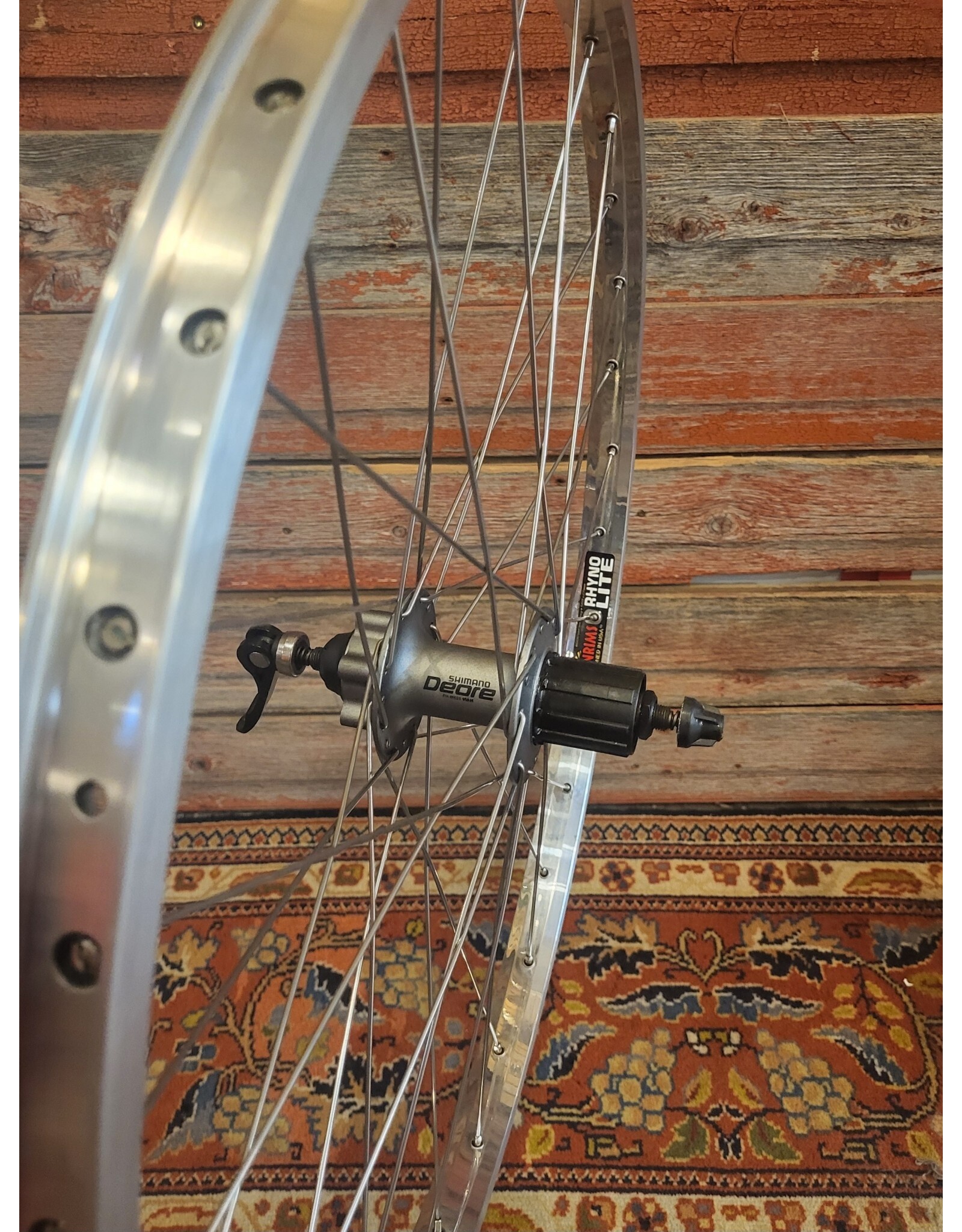 Natural Cycleworks Handbuilt Wheel 26" - Rhyno Lite Polished - Shimano Deore Rear - Silver Straight Gauge Spokes