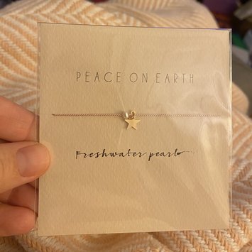 Mai Lin Jewelry - MLJ MLJ JEBR - "Peace on Earth" Pearl, Silk Cord Bracelet