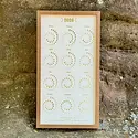 Margins Imprint - MAR MAR CAWA - 2026 Gold on Peal White Moon Phase Calendar (unframed)
