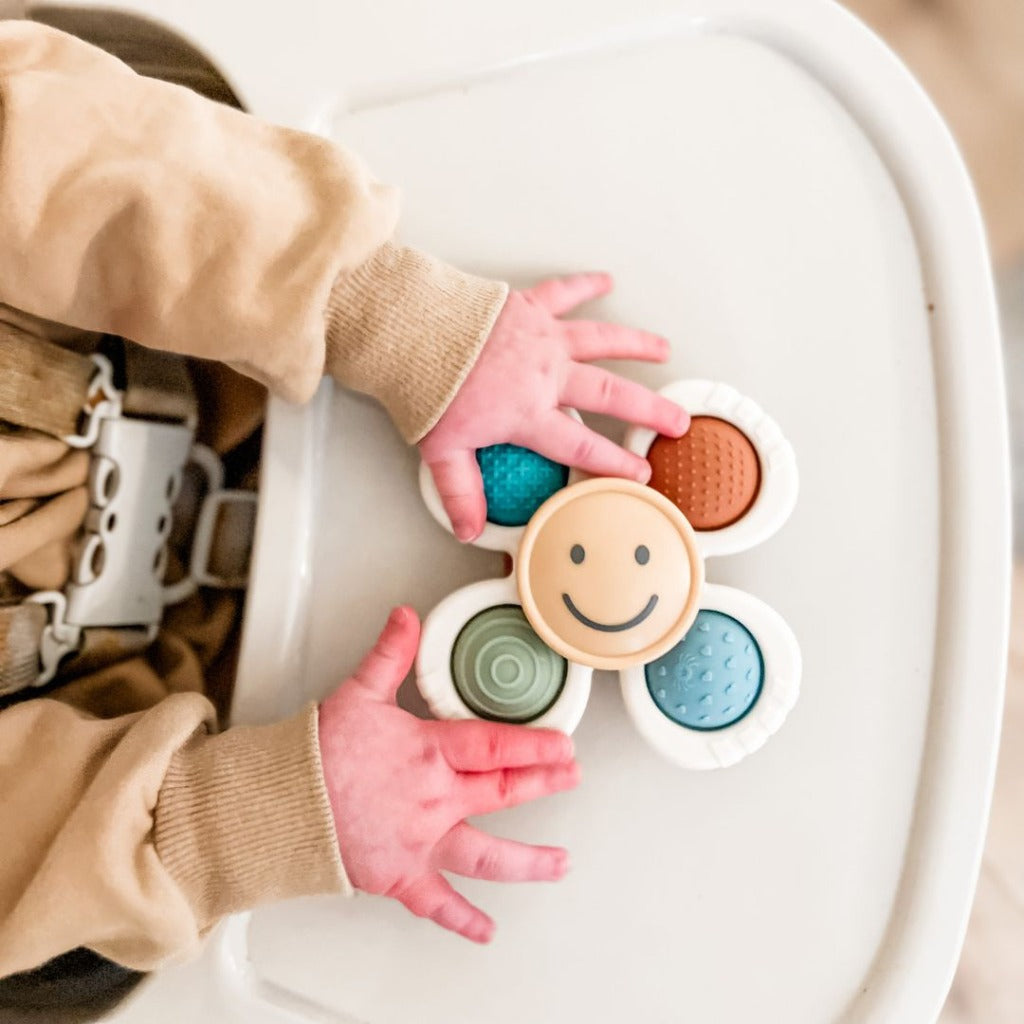Itzy Ritzy Itzy Pop & Whirl Sensory Toy | Smile