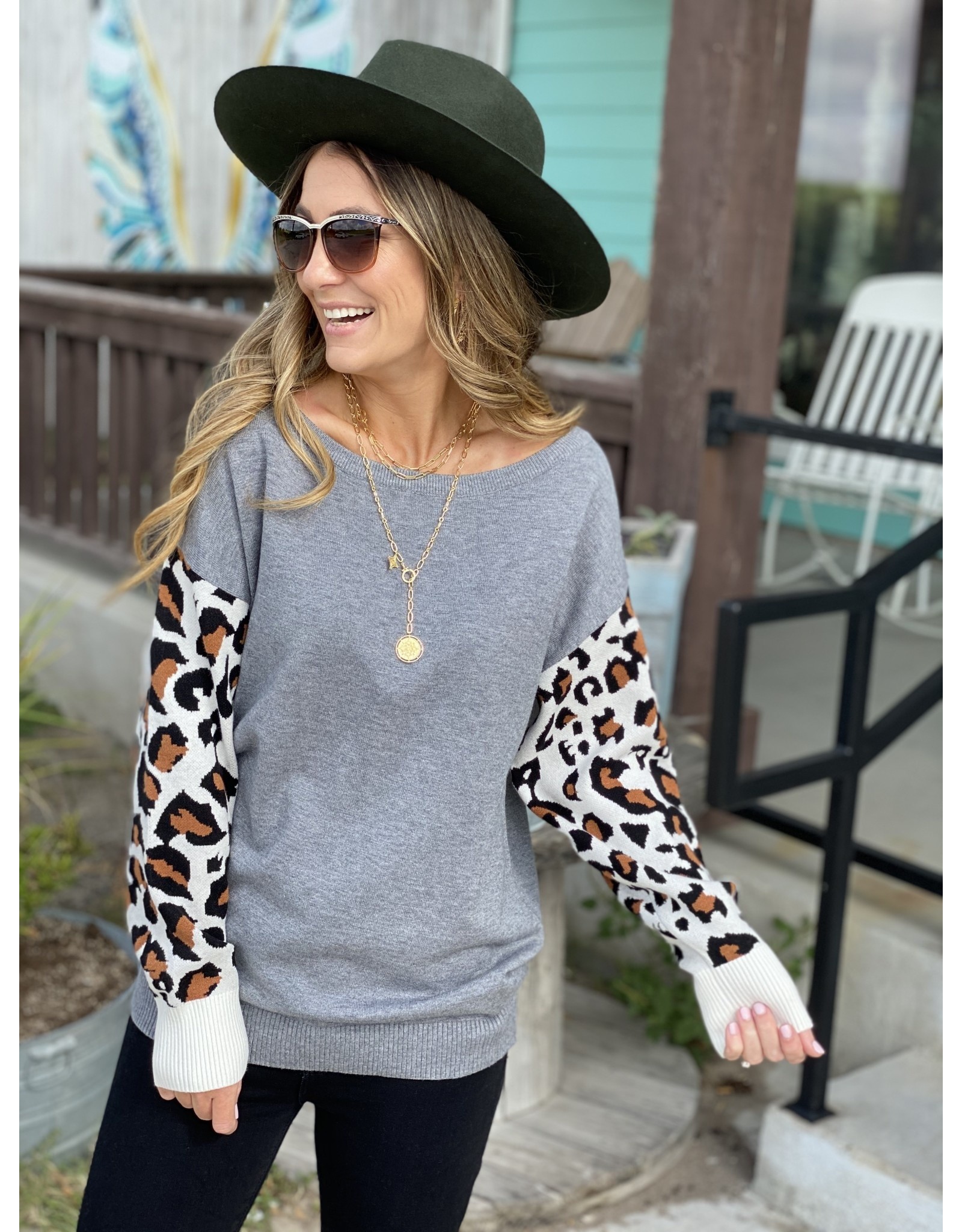 sweater with leopard sleeves