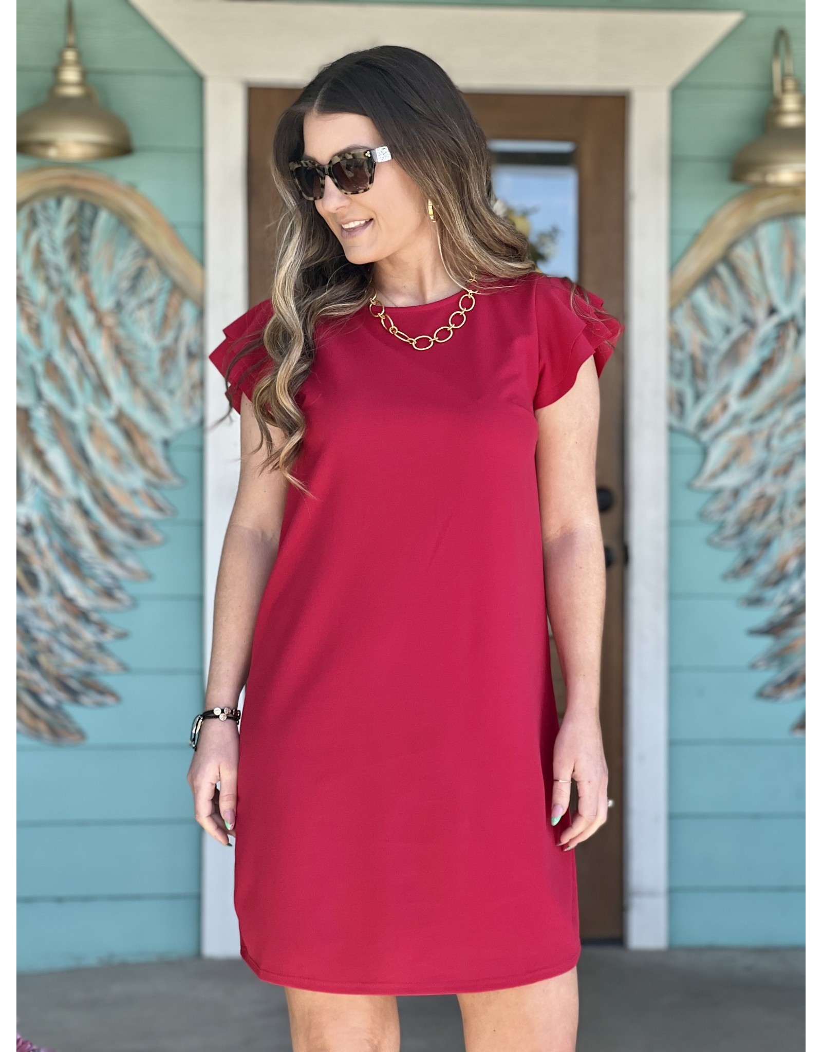 https://cdn.shoplightspeed.com/shops/612314/files/54168353/1600x2048x2/red-flutter-sleeve-dress.jpg